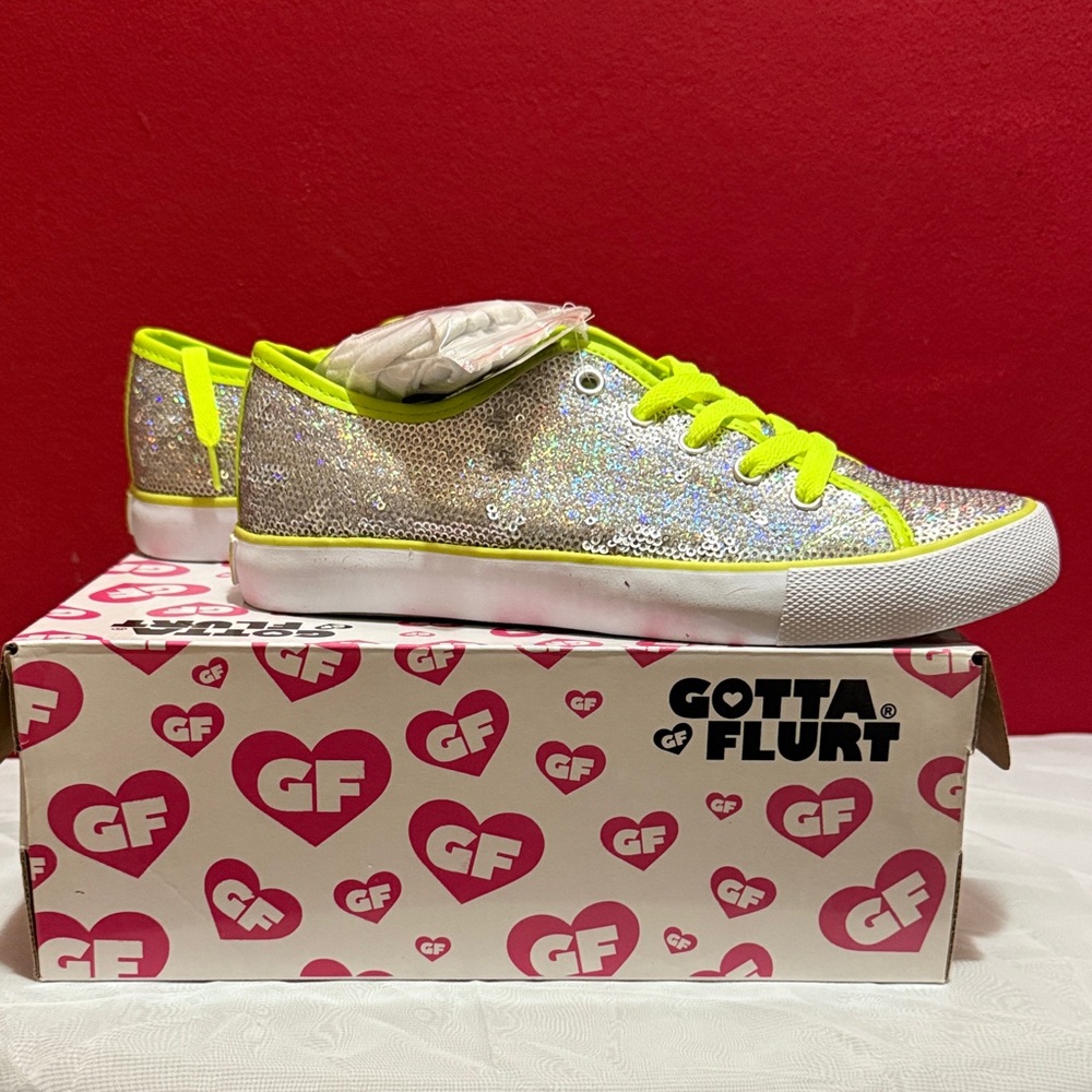 Gotta Flurt Sparkling Silver Sneakers with Neon Highlights